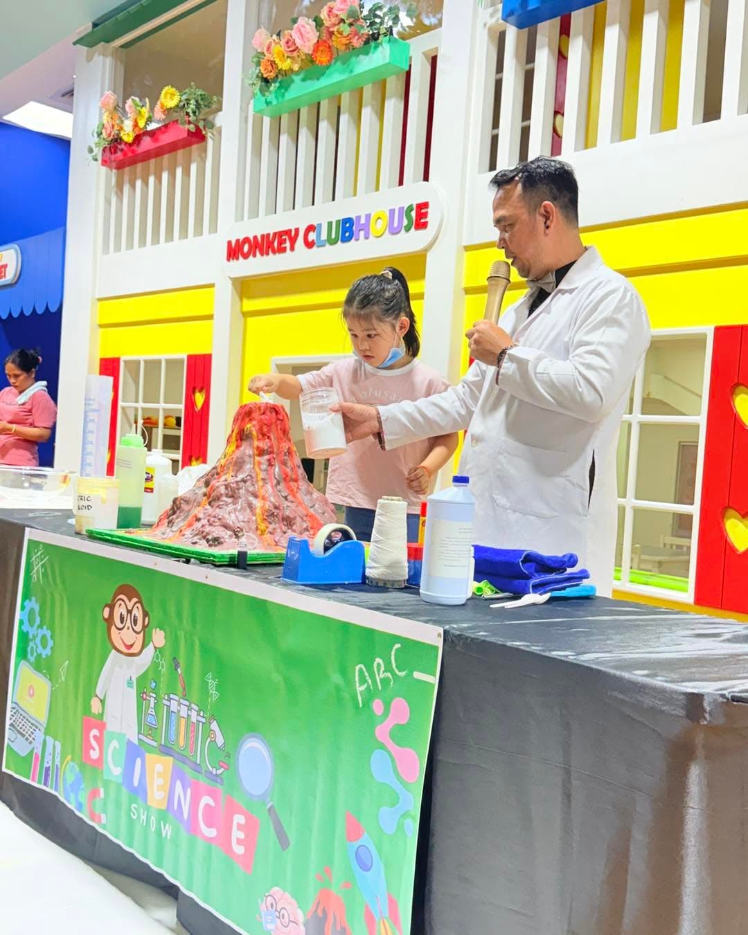 A science show demonstration in front of the Monkey Clubhouse